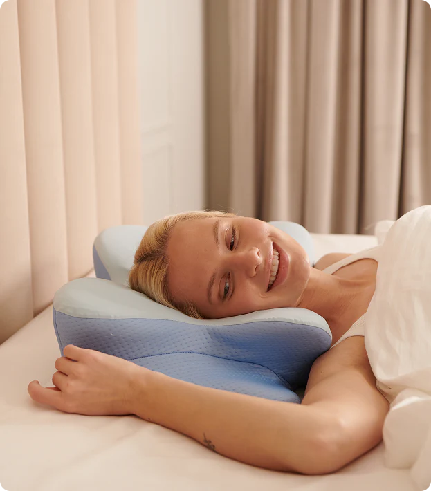 Derila Ergo Pillow in use — showing neck and spine alignment